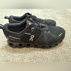 On cloud 5 waterproof black shoes. Size 7 women. Barely used.